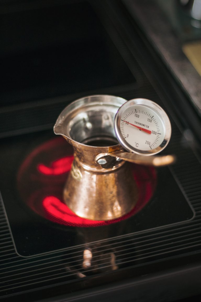 Measuring the temperature of coffee is important to taste